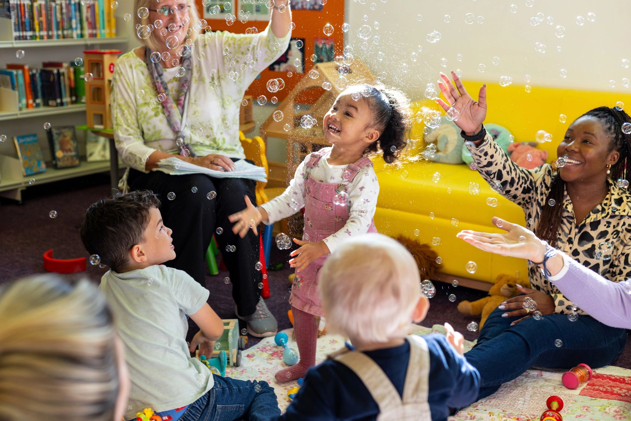 Children enjoying active educational play together